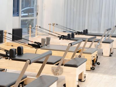 Bright and empty modern fitness studio interior.