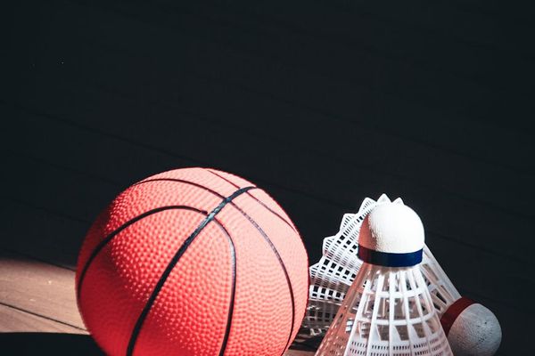 Minimalist training equipment on a white wooden floor.